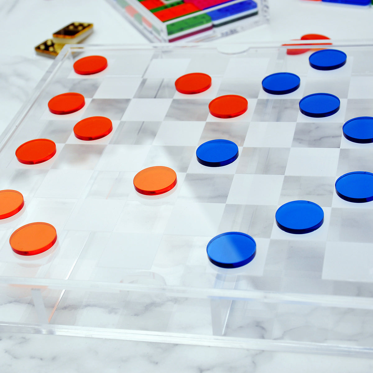 Jogo de damas em acrílico azul e laranja